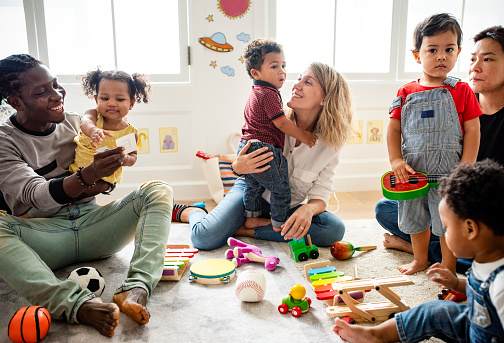 Diverse children enjoying playing with toys